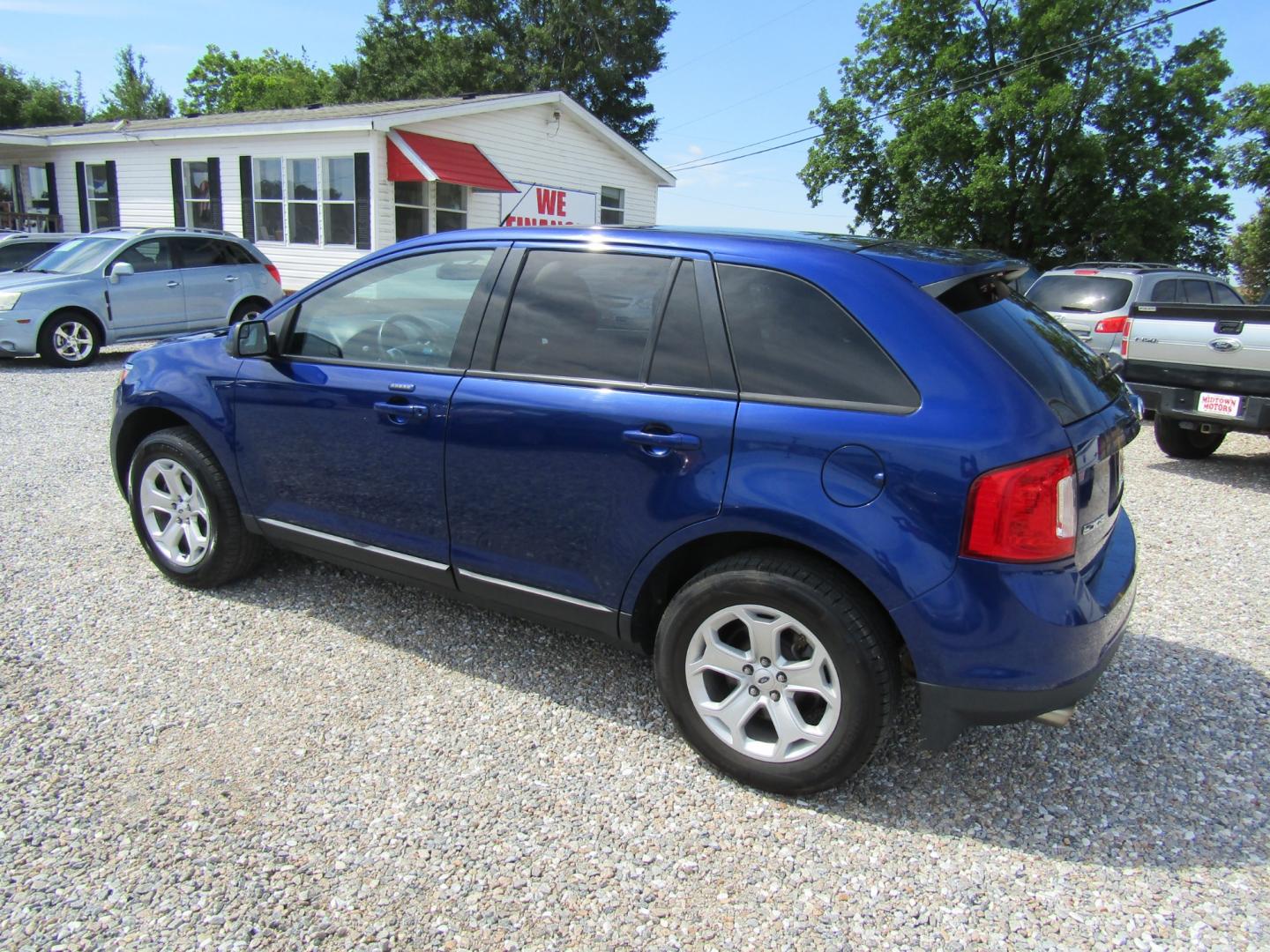 2013 Blue /Gray Ford Edge SEL FWD (2FMDK3JC6DB) with an 3.5L V6 DOHC 24V engine, Automatic transmission, located at 15016 S Hwy 231, Midland City, AL, 36350, (334) 983-3001, 31.306210, -85.495277 - Photo#5